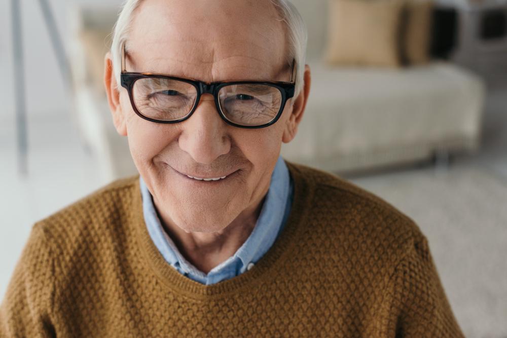 Old man wearing glasses smiling, columbus oh