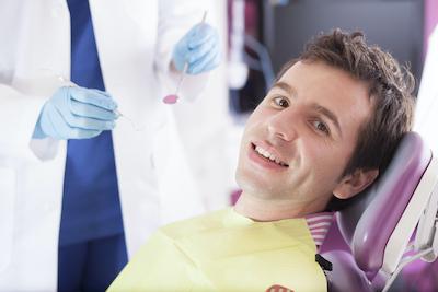 Man getting root canal in Columbus, OH