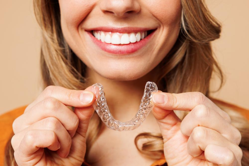 Woman smiling with clear aligner, clintonville oh