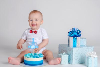 Baby smiling with birthday cake, clintonville oh