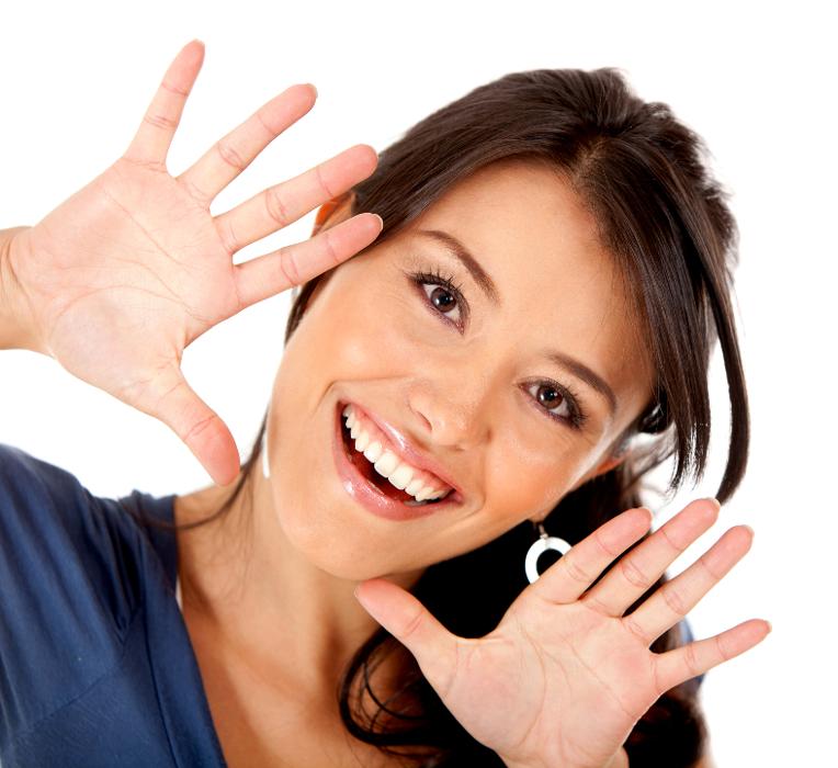 Woman smiling with hands framing her face, clintonville oh