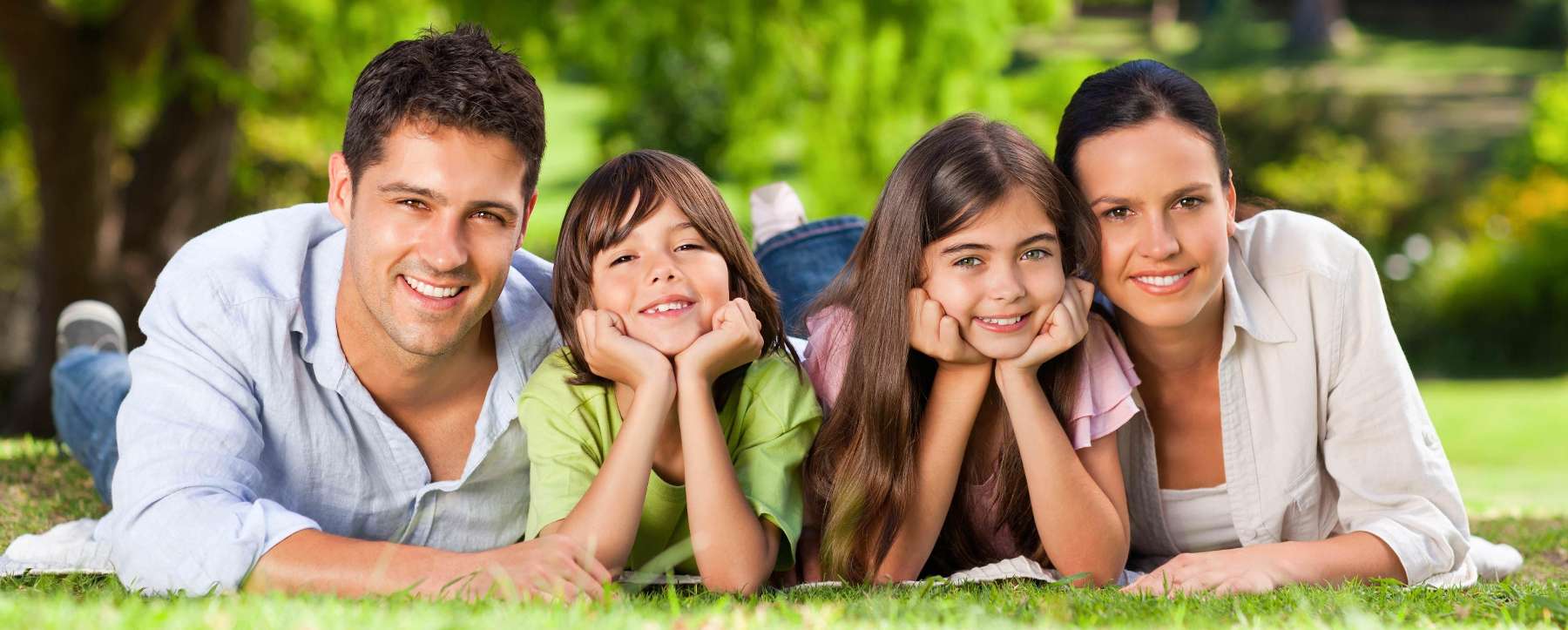 Family smiling together outside, clintonville oh