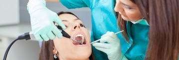 woman receiving dental exam | dentist columbus oh