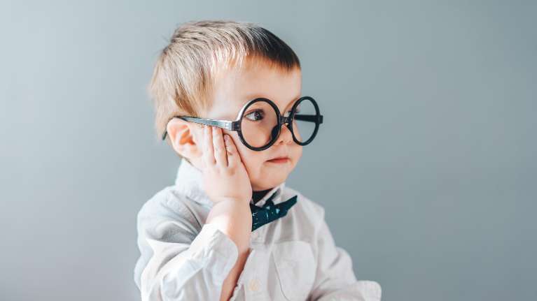 Little boy with eyeglasses | thumb sucking in Columbus OH