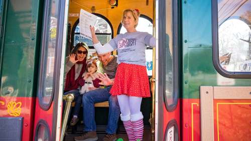 Woman holding paper in a bus, clintonville ohio