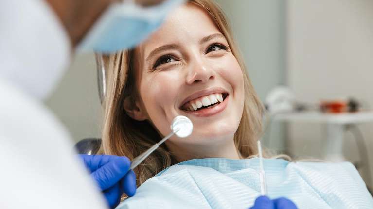 Woman undergoing a dental check up in Columbus