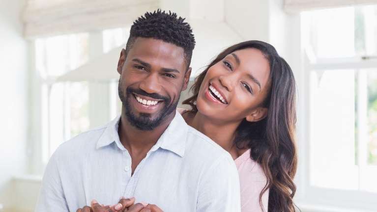 Black man and woman smiling, clintonville ohio