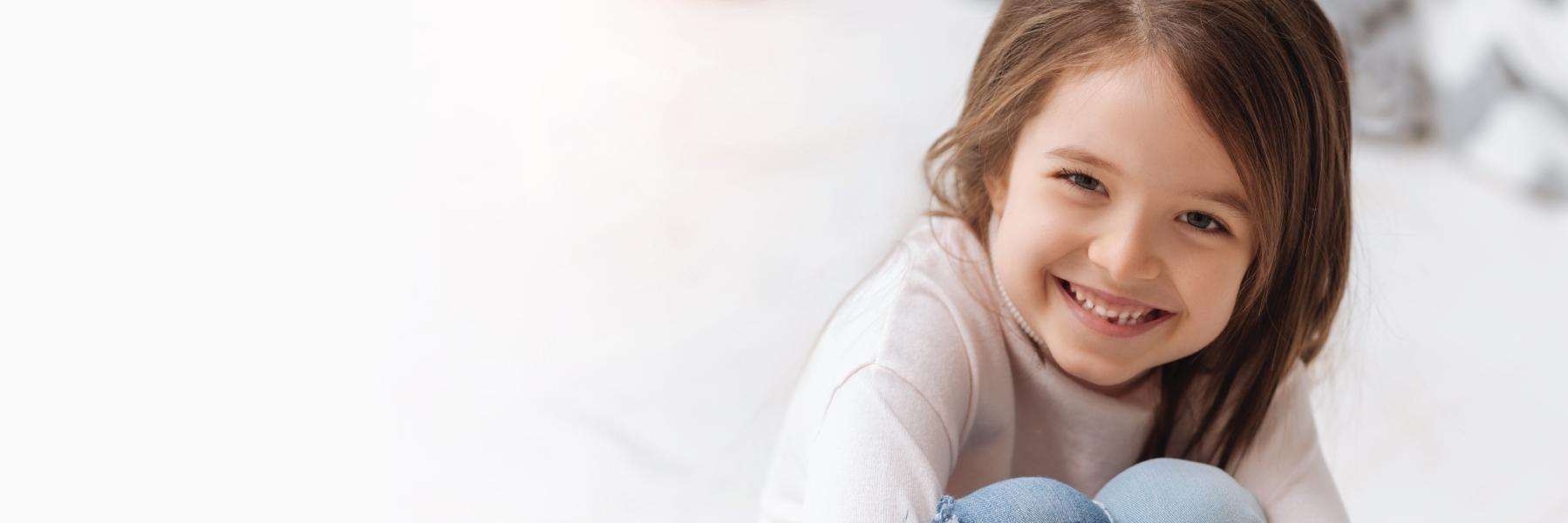 small girl laughing & smiling l children's dentist near me
