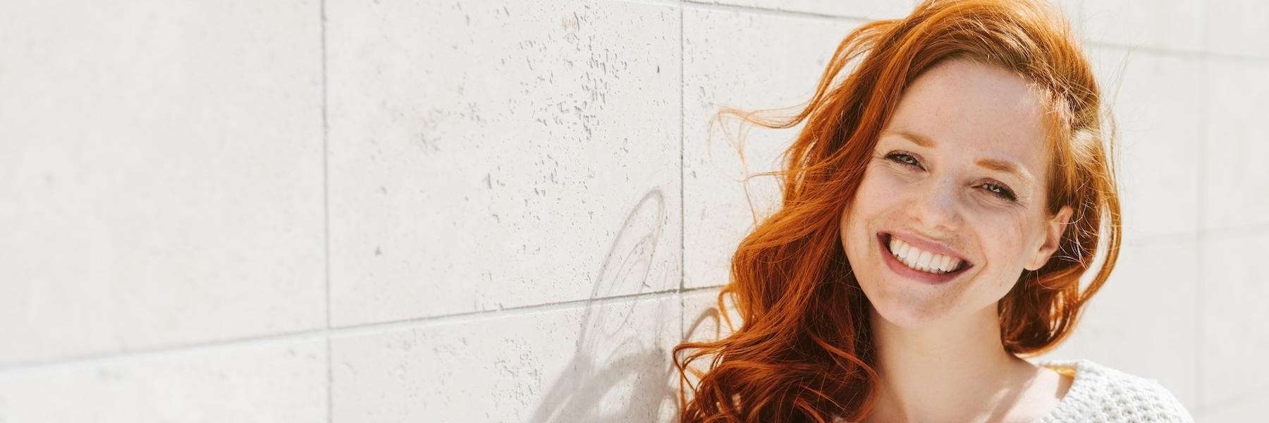 man with dark hair & glasses smiling l teeth whitening columbus